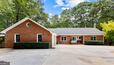 Enjoy the sunset views from 103 Lakeshore Drive, a remarkable on Highland Country Club in Georgia - for sale on GolfHomes.com, golf home, golf lot