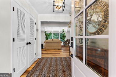 Enjoy the sunset views from 103 Lakeshore Drive, a remarkable on Highland Country Club in Georgia - for sale on GolfHomes.com, golf home, golf lot