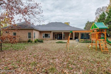 Stunning Home In Senatobia Awaits You! 4-bedroom, 3.5-bath home on Back Acres Country Club in Mississippi - for sale on GolfHomes.com, golf home, golf lot