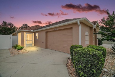 IMMACULATE, TURNKEY 3/2 BLOCK and STUCCO courtyard villa with on The Links of Spruce Creek in Florida - for sale on GolfHomes.com, golf home, golf lot