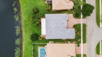 NEW INSTALLED TILE ROOF 20253 Bedroom 3 baths including a cabana on Champions Club at Summerfield in Florida - for sale on GolfHomes.com, golf home, golf lot