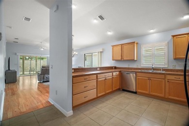 IMMACULATE, TURNKEY 3/2 BLOCK and STUCCO courtyard villa with on The Links of Spruce Creek in Florida - for sale on GolfHomes.com, golf home, golf lot