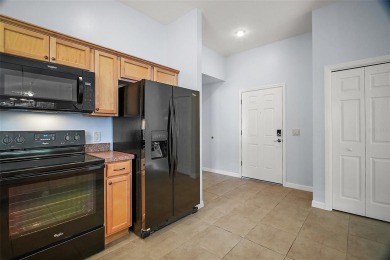 IMMACULATE, TURNKEY 3/2 BLOCK and STUCCO courtyard villa with on The Links of Spruce Creek in Florida - for sale on GolfHomes.com, golf home, golf lot