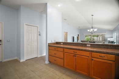 IMMACULATE, TURNKEY 3/2 BLOCK and STUCCO courtyard villa with on The Links of Spruce Creek in Florida - for sale on GolfHomes.com, golf home, golf lot