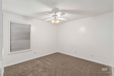 This charming 3 bed/2 bath Lake Forest cottage on a spacious on Lake Forest Yacht and Country Club in Alabama - for sale on GolfHomes.com, golf home, golf lot