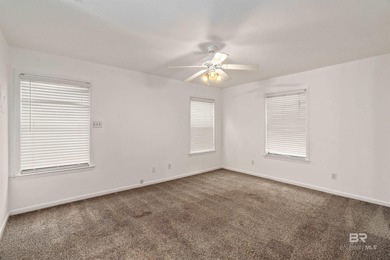 This charming 3 bed/2 bath Lake Forest cottage on a spacious on Lake Forest Yacht and Country Club in Alabama - for sale on GolfHomes.com, golf home, golf lot