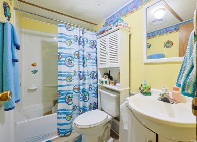 Welcome to 1522 Cove Lane -- a beautifully updated home with no on Wachesaw Plantation Club in South Carolina - for sale on GolfHomes.com, golf home, golf lot