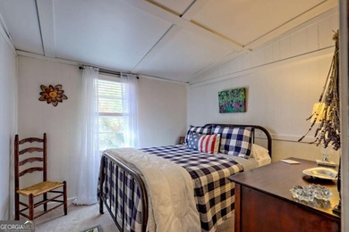 Charming Lake Burton Cottage with Deeded Lake Access - Under on Waterfall Country Club in Georgia - for sale on GolfHomes.com, golf home, golf lot