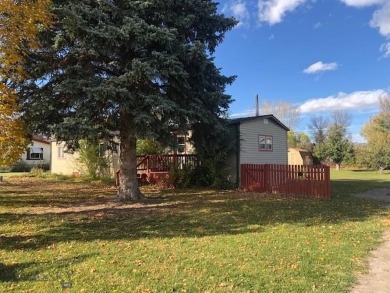 Great location for this clean and tidy older mobile in Three on Headwaters Golf Course in Montana - for sale on GolfHomes.com, golf home, golf lot