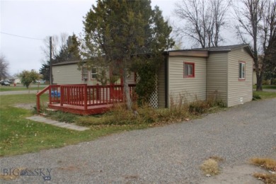 Great location for this clean and tidy older mobile in Three on Headwaters Golf Course in Montana - for sale on GolfHomes.com, golf home, golf lot