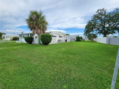 NEW ROOF 10/24.  Charming Corner Lot Home located in Heather on Heather Hills Golf Course in Florida - for sale on GolfHomes.com, golf home, golf lot