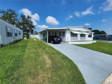 NEW ROOF 10/24.  Charming Corner Lot Home located in Heather on Heather Hills Golf Course in Florida - for sale on GolfHomes.com, golf home, golf lot