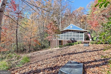 Charming Lake Burton Cottage with Deeded Lake Access - Under on Waterfall Country Club in Georgia - for sale on GolfHomes.com, golf home, golf lot