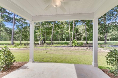 Enjoy a great view of your friends and neighbors as they tee off on Players Course At Wyboo Plantation in South Carolina - for sale on GolfHomes.com, golf home, golf lot