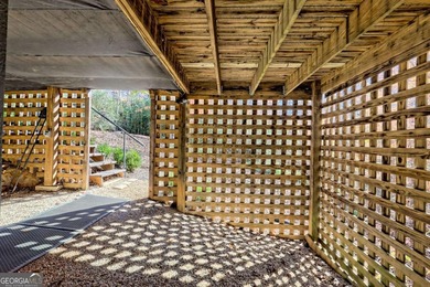 Charming Lake Burton Cottage with Deeded Lake Access - Under on Waterfall Country Club in Georgia - for sale on GolfHomes.com, golf home, golf lot