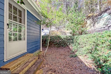 Charming Lake Burton Cottage with Deeded Lake Access - Under on Waterfall Country Club in Georgia - for sale on GolfHomes.com, golf home, golf lot