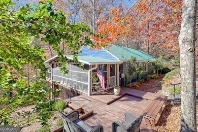 Charming Lake Burton Cottage with Deeded Lake Access - Under on Waterfall Country Club in Georgia - for sale on GolfHomes.com, golf home, golf lot