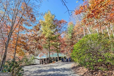 Charming Lake Burton Cottage with Deeded Lake Access - Under on Waterfall Country Club in Georgia - for sale on GolfHomes.com, golf home, golf lot