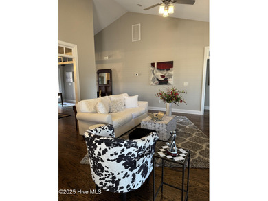 This meticulously maintained 2400 square foot home, nestled in on Castle Bay Golf and Country Club in North Carolina - for sale on GolfHomes.com, golf home, golf lot