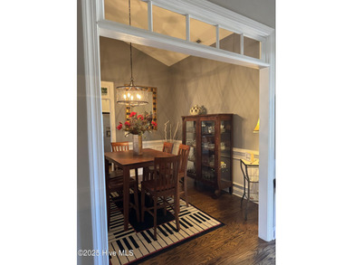 This meticulously maintained 2400 square foot home, nestled in on Castle Bay Golf and Country Club in North Carolina - for sale on GolfHomes.com, golf home, golf lot