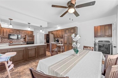Updated, Luxury - 5 Bed | 3 Bath+ | Pool & Hot Tub | Golf Course on Country Club of Blue Springs in Missouri - for sale on GolfHomes.com, golf home, golf lot
