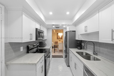 This beautifully updated 3 bed/2 bath offers a large layout of on Pembroke Lakes Golf Club in Florida - for sale on GolfHomes.com, golf home, golf lot