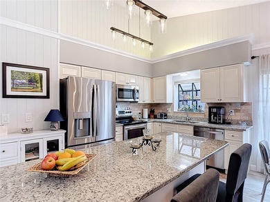 Palm Harbor - Nestled in the gated community of Wescott Square on Tarpon Woods Golf Club in Florida - for sale on GolfHomes.com, golf home, golf lot