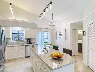 Palm Harbor - Nestled in the gated community of Wescott Square on Tarpon Woods Golf Club in Florida - for sale on GolfHomes.com, golf home, golf lot