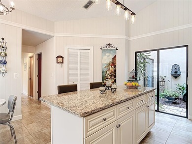 Palm Harbor - Nestled in the gated community of Wescott Square on Tarpon Woods Golf Club in Florida - for sale on GolfHomes.com, golf home, golf lot