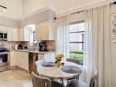 Palm Harbor - Nestled in the gated community of Wescott Square on Tarpon Woods Golf Club in Florida - for sale on GolfHomes.com, golf home, golf lot