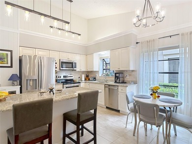 Palm Harbor - Nestled in the gated community of Wescott Square on Tarpon Woods Golf Club in Florida - for sale on GolfHomes.com, golf home, golf lot