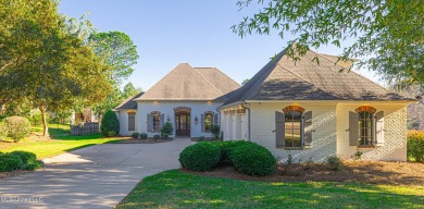 Nestled in a cul-de-sac in Reunion Golf & Country Club, this on Reunion Golf Club in Mississippi - for sale on GolfHomes.com, golf home, golf lot