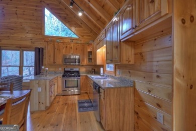 Tucked between Ellijay and Blue Ridge in the sought-after on White Path Golf Club in Georgia - for sale on GolfHomes.com, golf home, golf lot