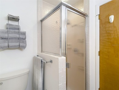 Palm Harbor - Nestled in the gated community of Wescott Square on Tarpon Woods Golf Club in Florida - for sale on GolfHomes.com, golf home, golf lot