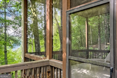 Nestled in the coveted Waterfall at Lake Burton community, this on Waterfall Country Club in Georgia - for sale on GolfHomes.com, golf home, golf lot
