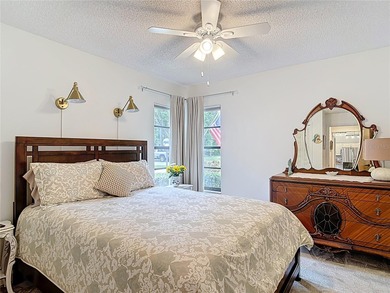 Palm Harbor - Nestled in the gated community of Wescott Square on Tarpon Woods Golf Club in Florida - for sale on GolfHomes.com, golf home, golf lot