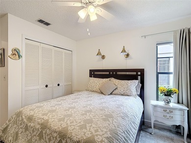 Palm Harbor - Nestled in the gated community of Wescott Square on Tarpon Woods Golf Club in Florida - for sale on GolfHomes.com, golf home, golf lot