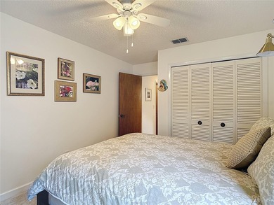 Palm Harbor - Nestled in the gated community of Wescott Square on Tarpon Woods Golf Club in Florida - for sale on GolfHomes.com, golf home, golf lot