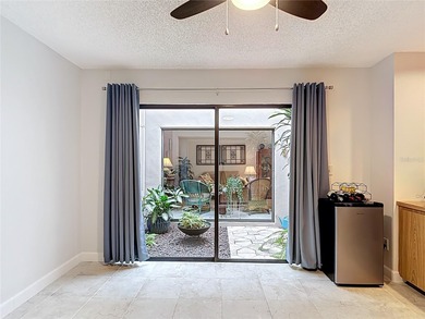 Palm Harbor - Nestled in the gated community of Wescott Square on Tarpon Woods Golf Club in Florida - for sale on GolfHomes.com, golf home, golf lot