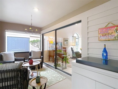 Palm Harbor - Nestled in the gated community of Wescott Square on Tarpon Woods Golf Club in Florida - for sale on GolfHomes.com, golf home, golf lot