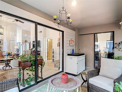 Palm Harbor - Nestled in the gated community of Wescott Square on Tarpon Woods Golf Club in Florida - for sale on GolfHomes.com, golf home, golf lot