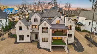 Set within The River Club, an exclusive gated enclave offering on The River Club in Georgia - for sale on GolfHomes.com, golf home, golf lot