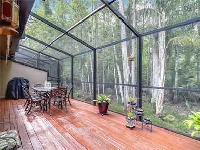 Palm Harbor - Nestled in the gated community of Wescott Square on Tarpon Woods Golf Club in Florida - for sale on GolfHomes.com, golf home, golf lot