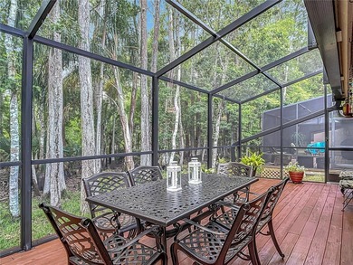 Palm Harbor - Nestled in the gated community of Wescott Square on Tarpon Woods Golf Club in Florida - for sale on GolfHomes.com, golf home, golf lot