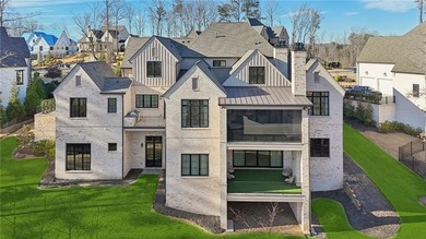 Set within The River Club, an exclusive gated enclave offering on The River Club in Georgia - for sale on GolfHomes.com, golf home, golf lot