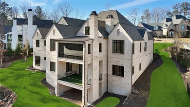 Set within The River Club, an exclusive gated enclave offering on The River Club in Georgia - for sale on GolfHomes.com, golf home, golf lot