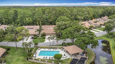 Palm Harbor - Nestled in the gated community of Wescott Square on Tarpon Woods Golf Club in Florida - for sale on GolfHomes.com, golf home, golf lot