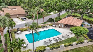 Palm Harbor - Nestled in the gated community of Wescott Square on Tarpon Woods Golf Club in Florida - for sale on GolfHomes.com, golf home, golf lot
