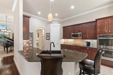 Located on a quiet cul-de-sac in the highly sought-after gated on Plantation Bay Golf and Country Club in Florida - for sale on GolfHomes.com, golf home, golf lot