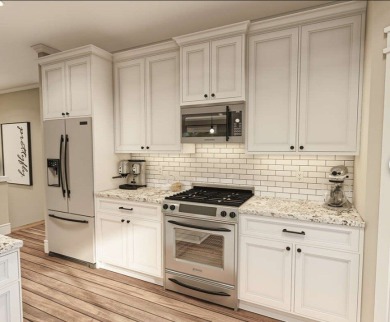 Act now to secure this stunning new-build ranch in Chapel Creek on Santee National Golf Course in South Carolina - for sale on GolfHomes.com, golf home, golf lot
